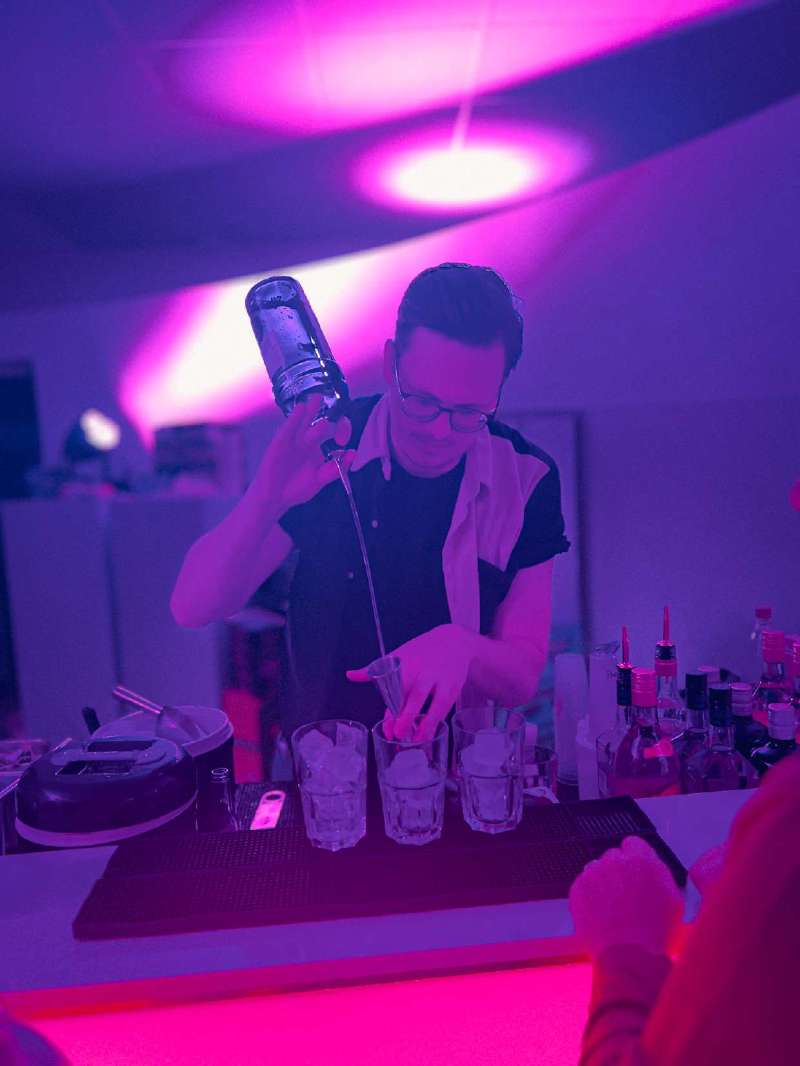 Barkeeper mixing cocktails